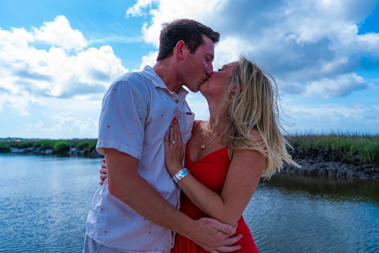 A wedding or engagement moment photographed by Stephen Groves of CaptureCHS.